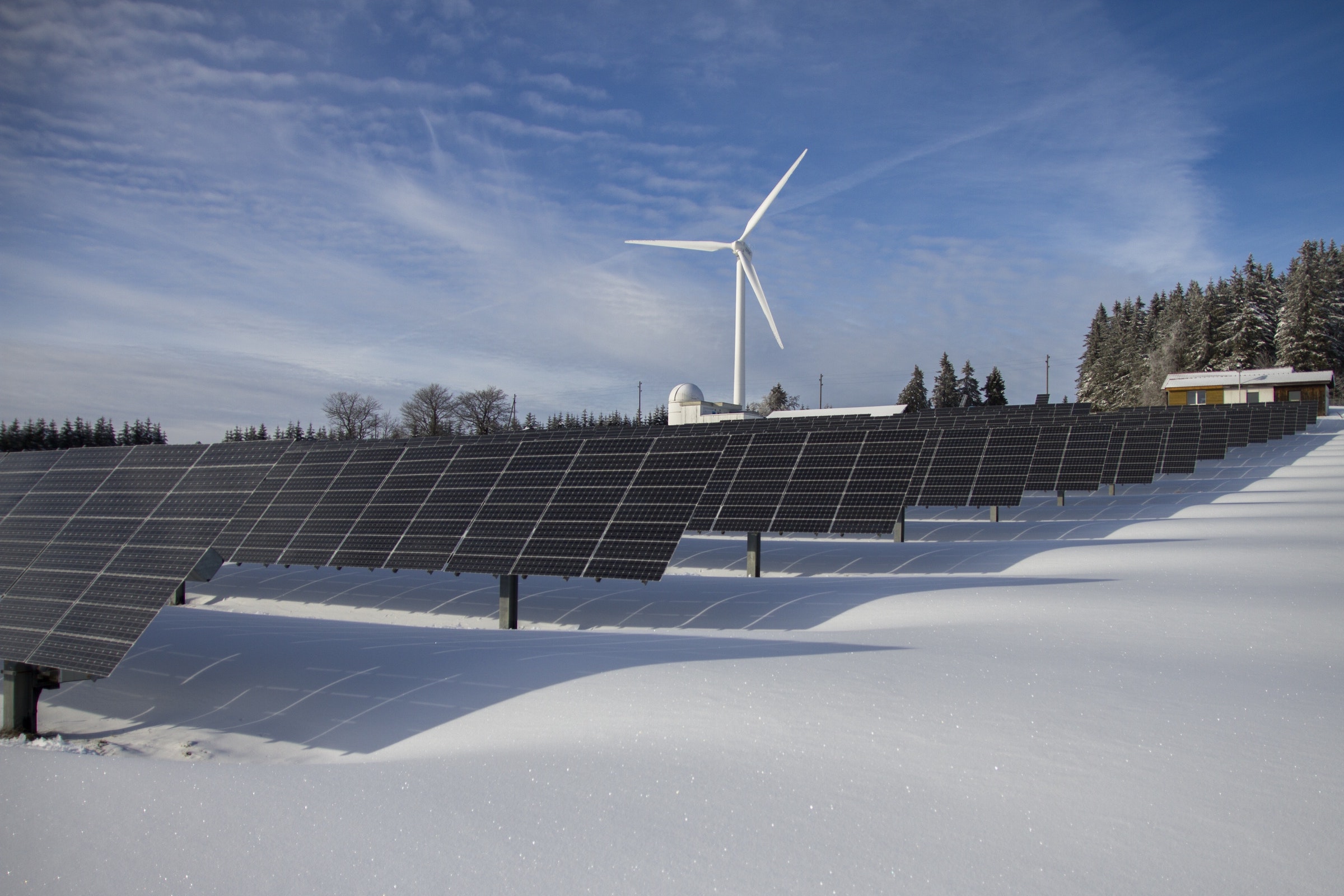 image of wind turbine with solar panel